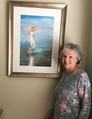 Darlene Hayes with custom framed artwork
